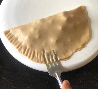 Marks of the fork on the edges of the paratha